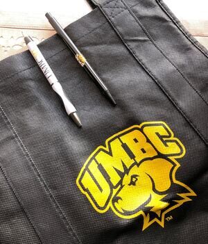 UMBC Black Tote Bag and 2 UMBC Pens